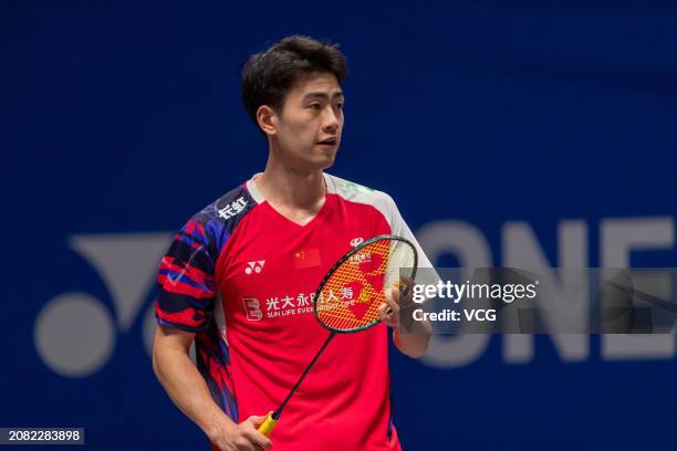 Wang Chang of China competes in the Men's Doubles Round of 32 match against Adam Dong Xingyu and Nyl Yakura of Canada during day two of the Yonex All...