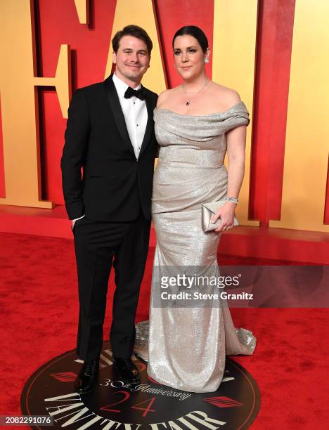 Jason Ritter, Melanie Lynskey arrives at the 2024 Vanity Fair Oscar Party Hosted By Radhika Jones at Wallis Annenberg Center for the Performing Arts...
