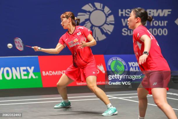 Jeong Na Eun and Kim Hye Jeong of South Korea compete in the Women's Doubles Round of 32 match against Zhang Shuxian and Zheng Yu of China during day...