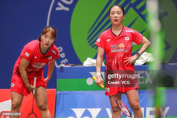Jeong Na Eun and Kim Hye Jeong of South Korea compete in the Women's Doubles Round of 32 match against Zhang Shuxian and Zheng Yu of China during day...