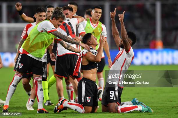 Rodrigo Aliendro of River Plate celebrates with teammate Miguel Borja after scoring the team's second goal during the Supercopa Argentina 2024 match...