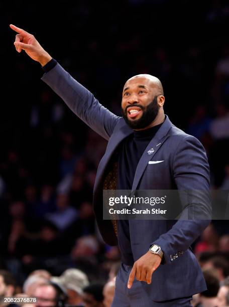 Head coach Kyle Neptune of the Villanova Wildcats directs his team in the first half against the DePaul Blue Demons during the First Round of the Big...