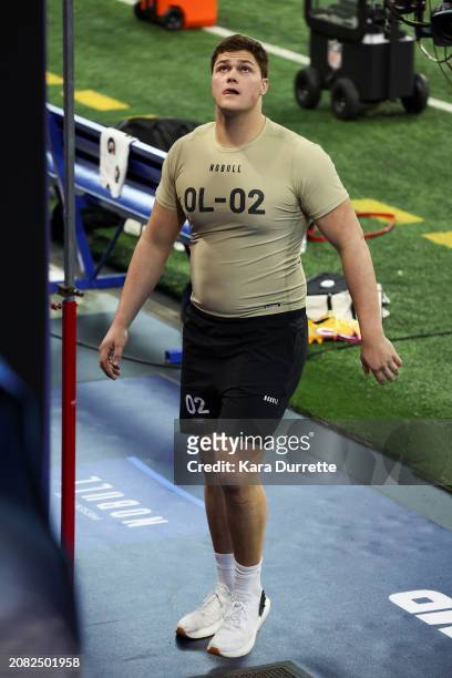 Joe Alt #OL02 of Notre Dame prepares for the vertical jump during the NFL Scouting Combine at Lucas Oil Stadium on March 3, 2024 in Indianapolis,...
