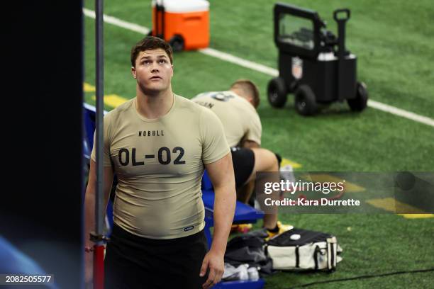 Joe Alt #OL02 of Notre Dame prepares for the vertical jump during the NFL Scouting Combine at Lucas Oil Stadium on March 3, 2024 in Indianapolis,...