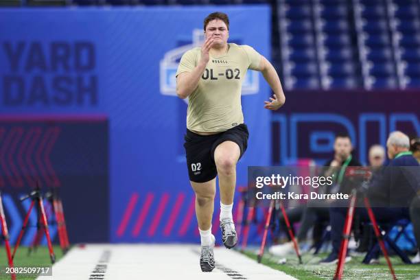 Joe Alt #OL02 of Notre Dame runs the 40-yard dash during the NFL Scouting Combine at Lucas Oil Stadium on March 3, 2024 in Indianapolis, Indiana.