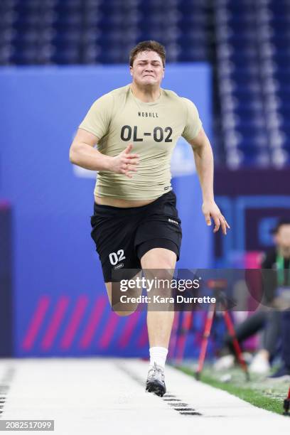 Joe Alt #OL02 of Notre Dame runs the 40-yard dash during the NFL Scouting Combine at Lucas Oil Stadium on March 3, 2024 in Indianapolis, Indiana.