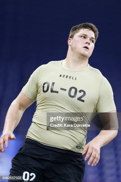 Joe Alt #OL02 of Notre Dame runs the 40-yard dash during the NFL Scouting Combine at Lucas Oil Stadium on March 3, 2024 in Indianapolis, Indiana.