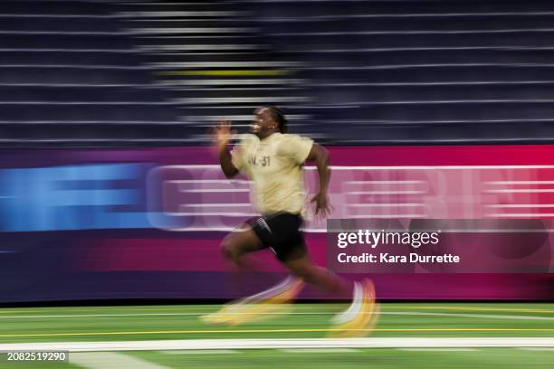 Tyler Guyton #OL31 of Oklahoma runs the 40-yard dash during the NFL Scouting Combine at Lucas Oil Stadium on March 3, 2024 in Indianapolis, Indiana.