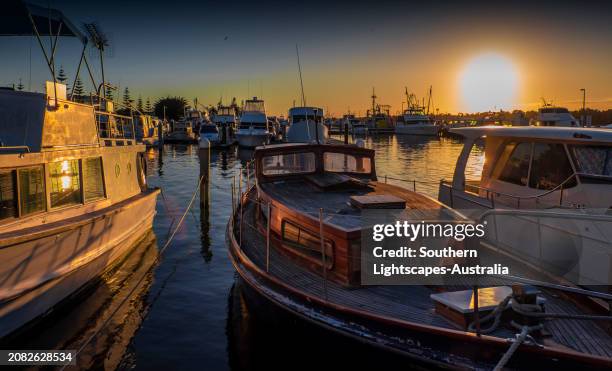 dawn light on a late summer's morning  at the lakes entrance harbour, victoria, australia. - australia jetty stock pictures, royalty-free photos & images