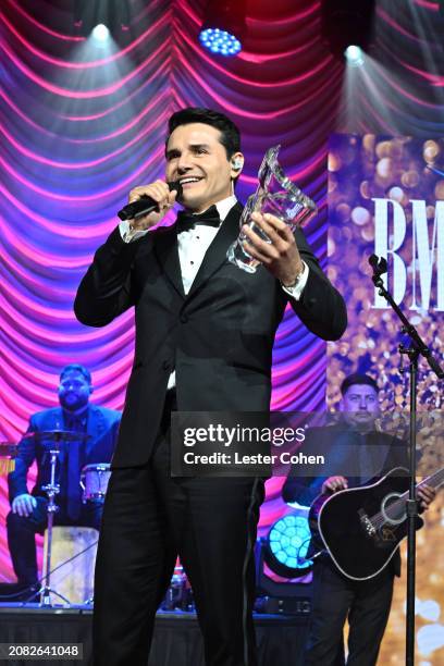 Horacio Palencia accepts an award onstage during the BMI Latin Awards 2024 at Beverly Wilshire, A Four Seasons Hotel on March 13, 2024 in Beverly...