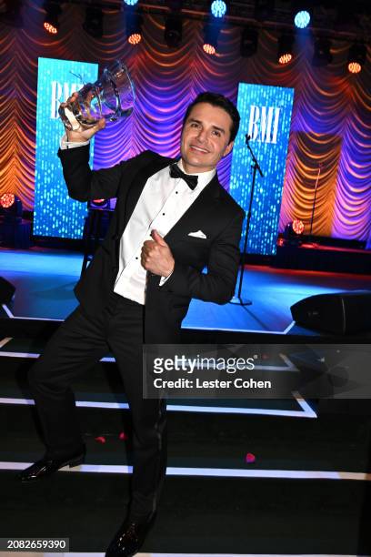 Horacio Palencia poses with his award during the BMI Latin Awards 2024 at Beverly Wilshire, A Four Seasons Hotel on March 13, 2024 in Beverly Hills,...