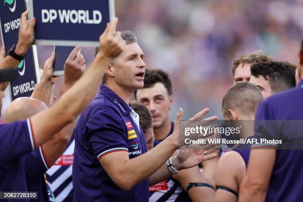 Justin Longmuir, Senior Coach of the Dockers addresses the team at the quarter time break during the 2024 AFL Round 01 match between the Fremantle...