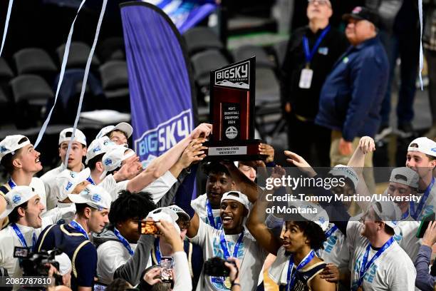 The Montana State Bobcats celebrate after beating the Montana Grizzlies 85-70 during the Big Sky Conference championship game at Idaho Central Arena...