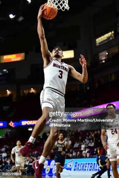 Josh Vazquez of the Montana Grizzlies shoots the ball in the second half against the Montana State Bobcats during the Big Sky Conference championship...