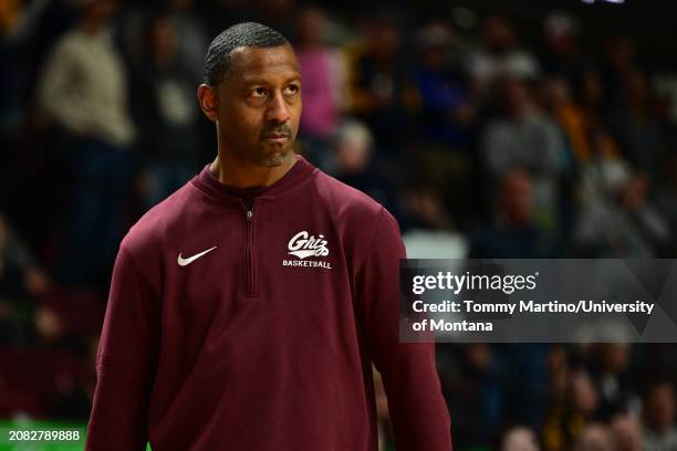 Head coach Travis DeCuire of the Montana Grizzlies looks on in the second half against the Montana State Bobcats during the Big Sky Conference...