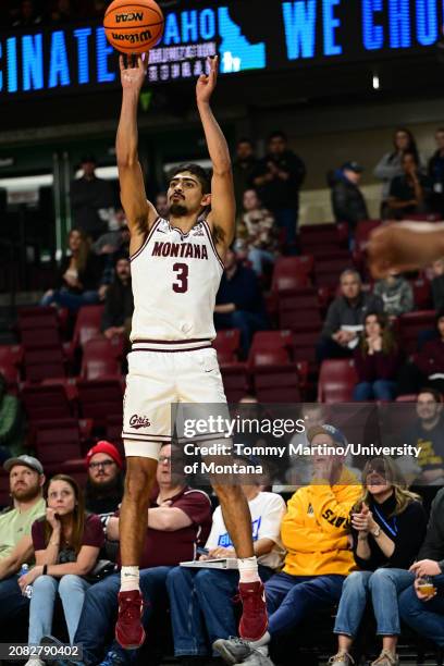 Josh Vazquez of the Montana Grizzlies shoots the ball against the Montana State Bobcats in the second half of the Big Sky Conference championship...