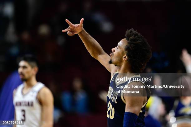 Robert Ford III of the Montana State Bobcats reacts after a 3-pointer in the second half against the Montana Grizzlies during the Big Sky Conference...