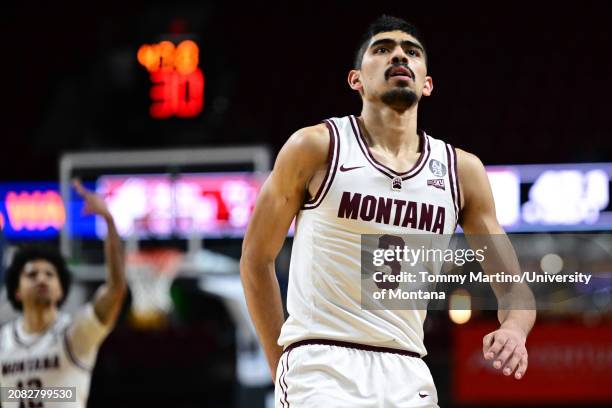 Josh Vazquez of the Montana Grizzlies reacts after a three-pointer in the first half against the Montana State Bobcats during the Big Sky Conference...