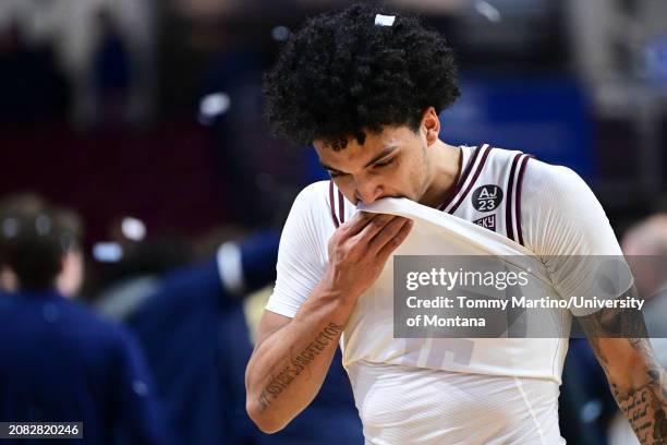 Brandon Whitney of the Montana Grizzlies walks off the court after losing to the Montana State Bobcats 85-70 during the Big Sky Conference...