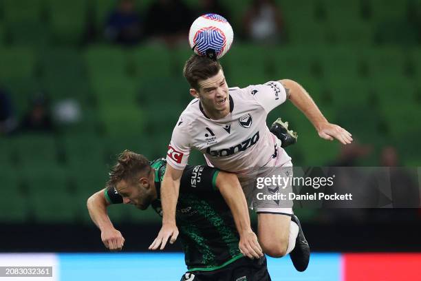 Connor Chapman of the Victory and Michael Ruhs of Western United contest the ball during the A-League Men round 21 match between Western United and...