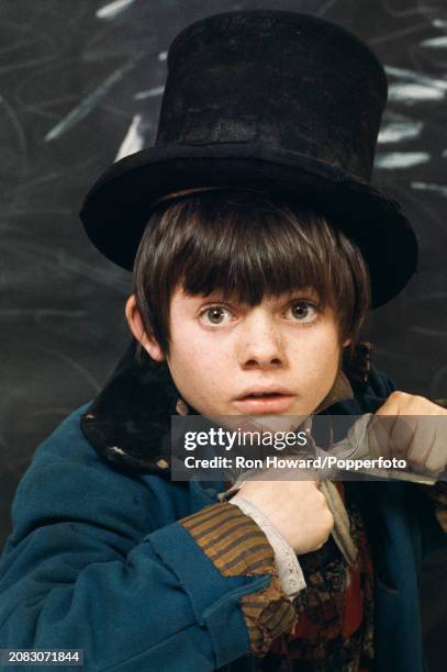 English actor and singer Jack Wild dressed in character as the Artful Dodger as played in the film version of Lionel Bart's stage musical Oliver!, in...