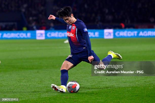 Lee Kang In of Paris Saint-Germain kicks the ball during the French Cup quarterfinal match between Paris Saint-Germain and OGC Nice at Parc des...
