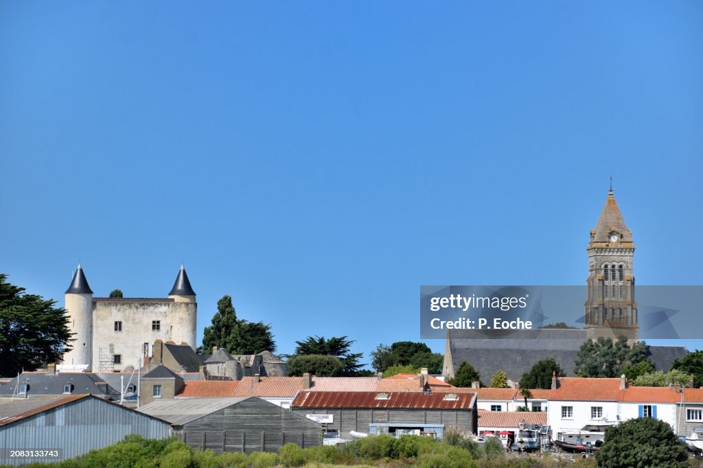 The island of Noirmoutier, the salt marshes, the medieval castle and the Saint-Philibert church