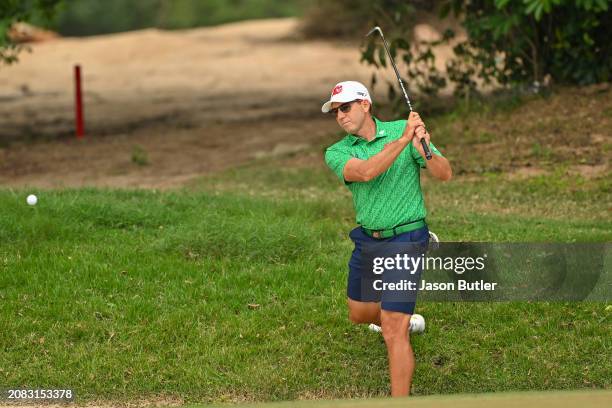 Sergio Garcia of Spain pitches onto the green on hole 11 during the first round of International Series Macau at Macau Golf and Country Club on March...