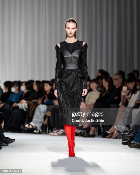 Model walks the runway in a design by TAE ASHIDA during the Rakuten Fashion Week TOKYO 2024 A/W on March 14, 2024 in Tokyo, Japan.