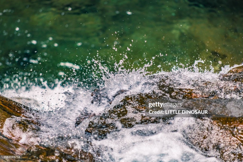 Splashing water drops of a mountain stream