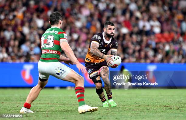 Adam Reynolds of the Broncos passes the ball during the round two NRL match between the Brisbane Broncos and South Sydney Rabbitohs at Suncorp...