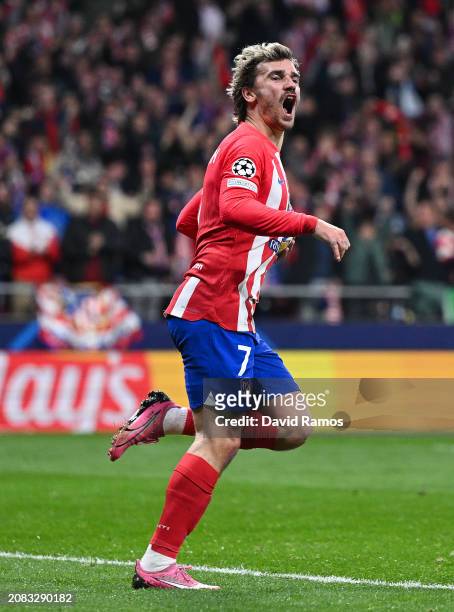 Antoine Griezmann of Atletico de Madrid celebrates their team's first goal during the UEFA Champions League 2023/24 round of 16 second leg match...