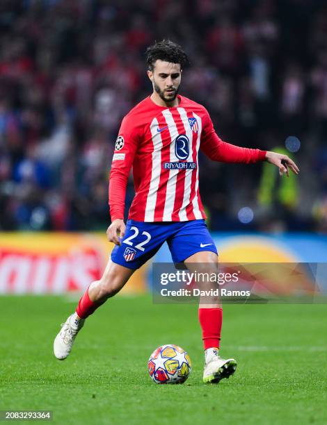 Mario Hermoso of Atletico de Madrid runs with the ball during the UEFA Champions League 2023/24 round of 16 second leg match between Atlético Madrid...