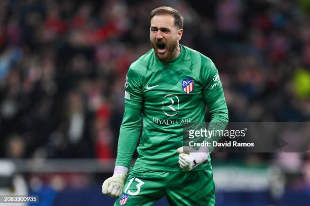 Jan Oblak of Atletico Madrid celebrates after teammate Memphis Depay scores his team's second goal during the UEFA Champions League 2023/24 round of...