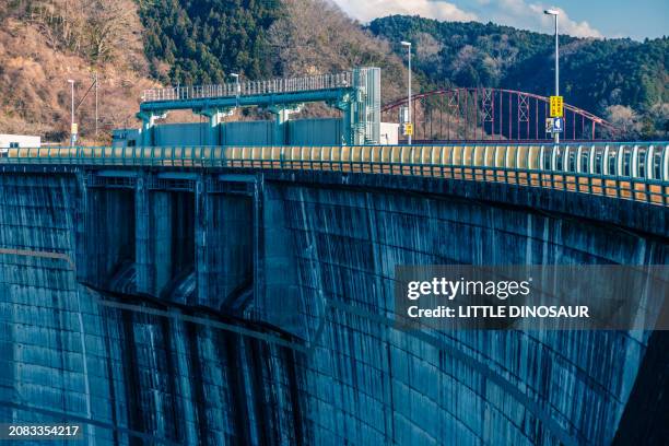 dam body and drainage outlet - sustainable energy japan stock pictures, royalty-free photos & images