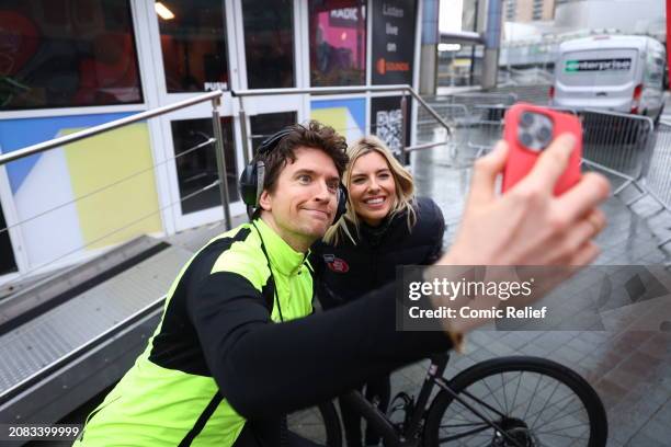 Singer and Radio DJ, Mollie King during the fourth day of her challenge, seen here setting off from Media City in Manchester being followed by Greg...