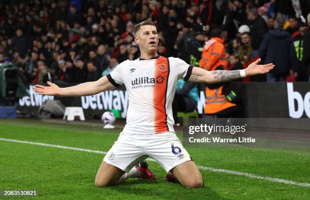 Ross Barkley of Luton Town celebrates scoring his team's third goal during the Premier League match between AFC Bournemouth and Luton Town at...