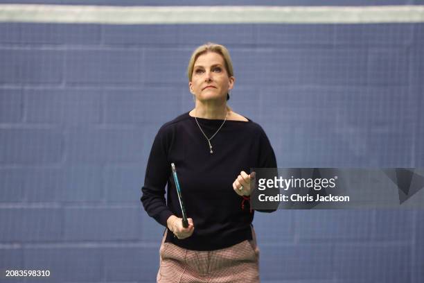 Sophie, Duchess of Edinburgh takes part in a badminton match as she attends the All England Open Badminton Championships with Prince Edward, Duke of...