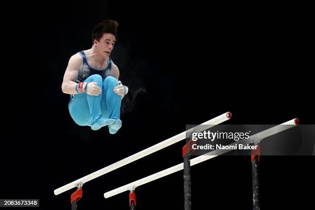 Kieron Innes of Fusion Gymnastics Wales competes on the parallel bars in the Men's Disability Masters during Day One of the 2024 Gymnastics British...