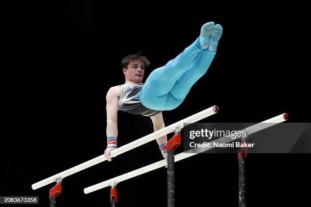 Kieron Innes of Fusion Gymnastics Wales competes on the parallel bars in the Men's Disability Masters during Day One of the 2024 Gymnastics British...