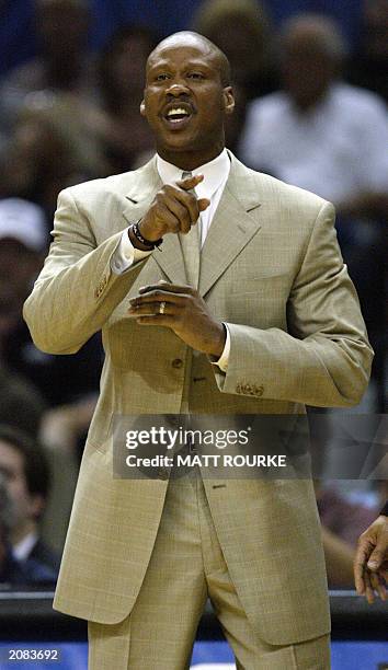 New Jersey Nets' coach Byron Scott directs his team against the San Antonio Spurs in first half action in Game 6 of the NBA Finals 15 June 2003 in...