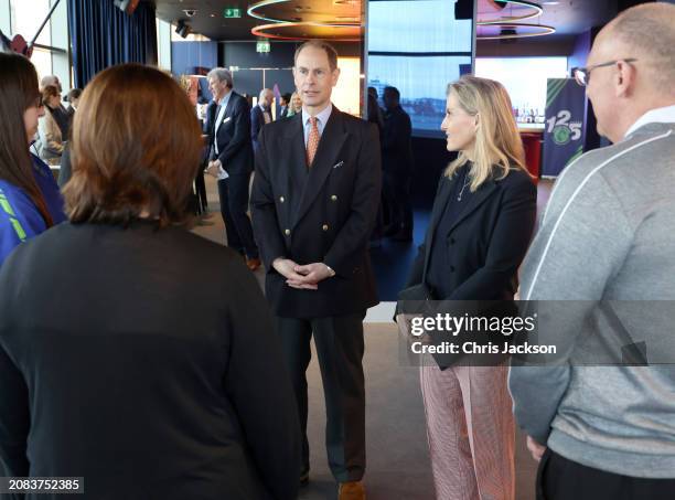 Prince Edward, Duke of Edinburgh and Sophie, Duchess of Edinburgh speak with staff members during their visit to the All England Open Badminton...