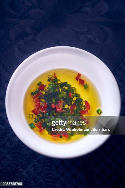 vinaigrette with chives in a bowl (seen from above) - vinaigrette stock pictures, royalty-free photos & images