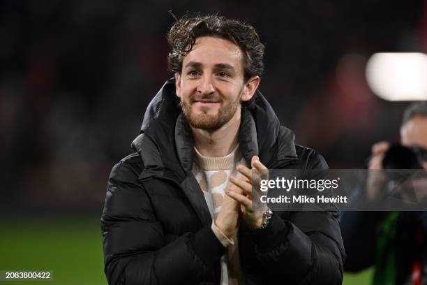 Tom Lockyer of Luton Town applauds the fans prior to the Premier League match between AFC Bournemouth and Luton Town at Vitality Stadium on March 13,...