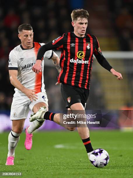 Alex Scott of Bournemouth gets away from Ross Barkley of Luton Town during the Premier League match between AFC Bournemouth and Luton Town at...