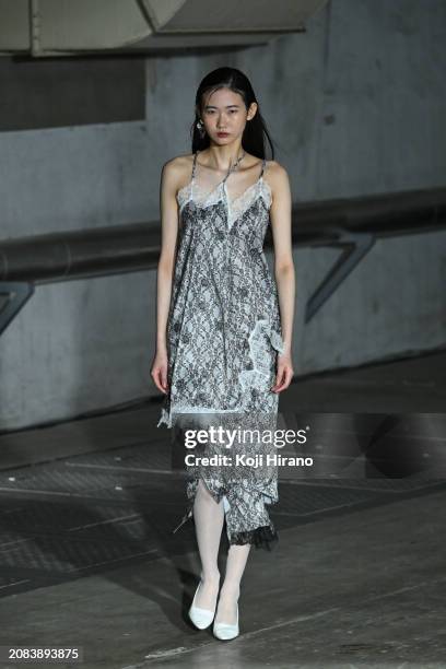 Model walks the runway in a design by AKIKOAOKI during the Rakuten Fashion Week TOKYO 2024 A/W on March 14, 2024 in Tokyo, Japan.