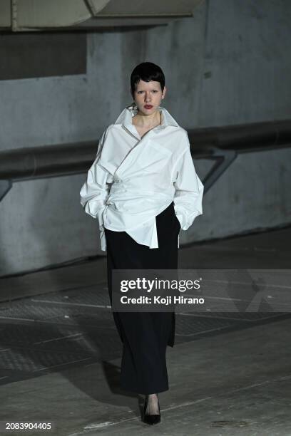 Model walks the runway in a design by AKIKOAOKI during the Rakuten Fashion Week TOKYO 2024 A/W on March 14, 2024 in Tokyo, Japan.