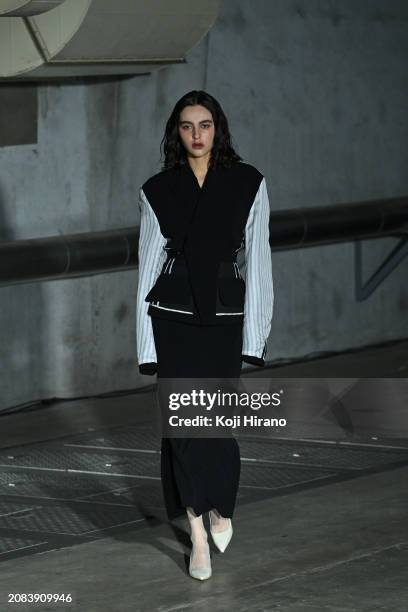 Model walks the runway in a design by AKIKOAOKI during the Rakuten Fashion Week TOKYO 2024 A/W on March 14, 2024 in Tokyo, Japan.