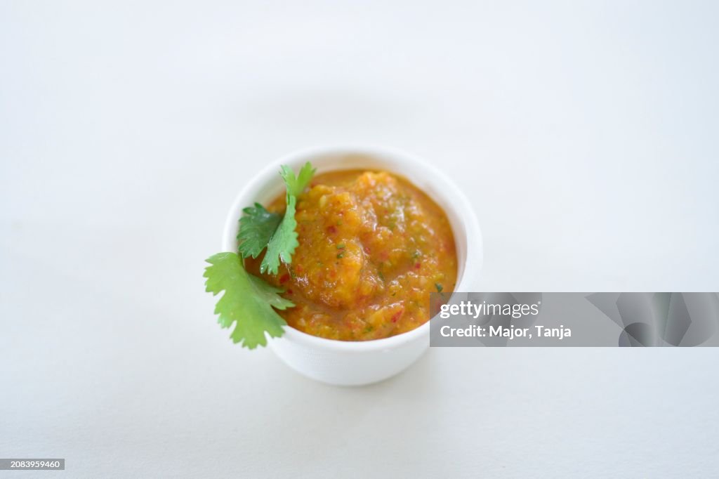 Vegetable sauce in a styrofoam bowl