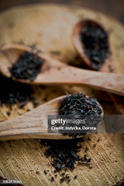 Earl Grey Tea Leaves On Wooden Spoons High-Res Stock Photo